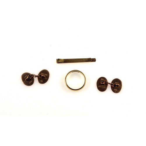 110 - 9ct Gold wedding band, 9ct gold tie pin and a pair of 9ct gold oval cufflinks, 10.6 grams (4)