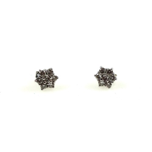 118 - Pair of 18ct white gold and diamond cluster earrings, diamonds 0.8ct approx.