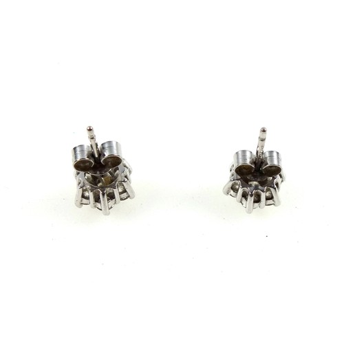 118 - Pair of 18ct white gold and diamond cluster earrings, diamonds 0.8ct approx.
