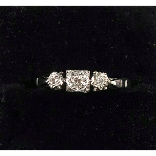 120 - White metal ring set three illusion cut diamonds, stamped 18ct and PLAT, ring size N, 2.7 grams