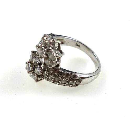 169 - White metal and diamond 'starry' cluster styled ring, stamped 750, 2.5cts diamonds approx., ring siz... 