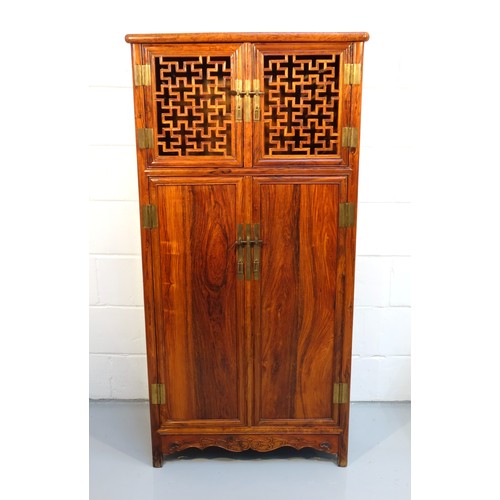 240 - Chinese rosewood cabinet (sold as Huanghuali by Tomlinson Antique House, Singapore), with a pierced ...