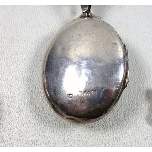 119 - Victorian ornate silver 'buckle' locket, by E.R, Birmingham 1901, on a fancy link white metal neckla... 