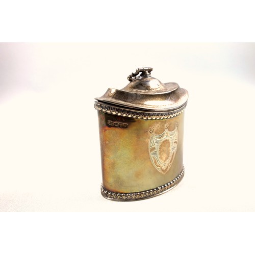 20 - Edwardian George III style silver tea caddy of navette form, with a central vacant cartouche between... 