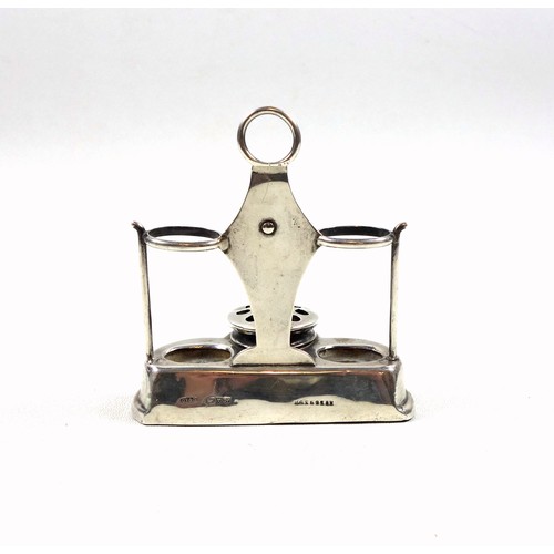 61 - Novelty George V silver tabletop vesta/match holder and striker, with a central taper stick holder, ... 