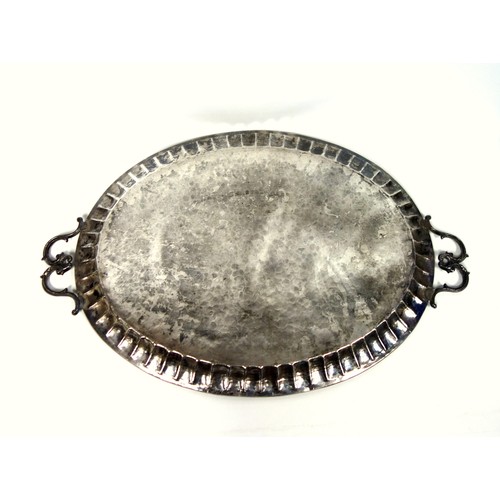 94 - Indian large silver plated oval tray with a fluted and gadrooned rim and 2 double scroll handles, W.... 