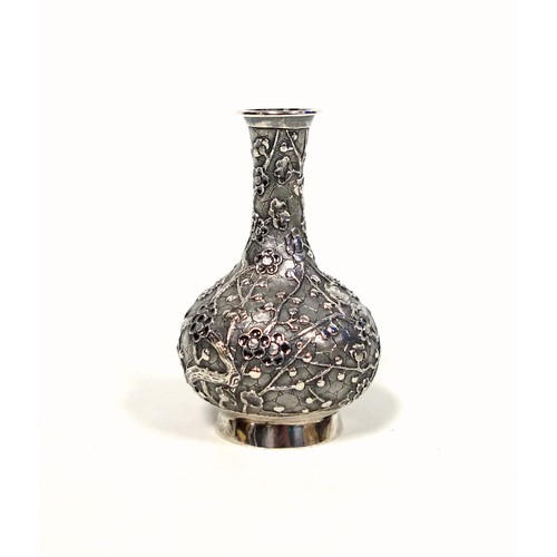 95 - Late 19th Century Chinese export silver baluster vase with a tall neck, flared rim, and all-over pru... 