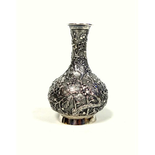 95 - Late 19th Century Chinese export silver baluster vase with a tall neck, flared rim, and all-over pru... 