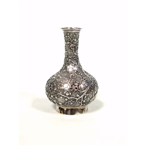 95 - Late 19th Century Chinese export silver baluster vase with a tall neck, flared rim, and all-over pru... 