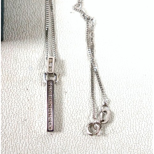 116 - Italian white metal fine flat curb link necklace with a rod pendant set 14 diamonds, stamped 