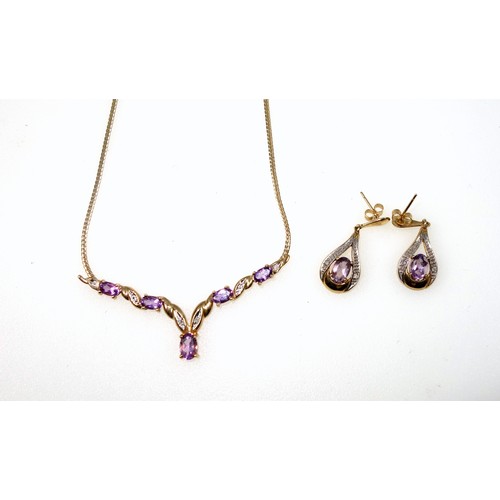 152 - 9ct gold, diamond and amethyst V-shaped necklace with pendant earrings ensuite, gross 6.1 grams (3)