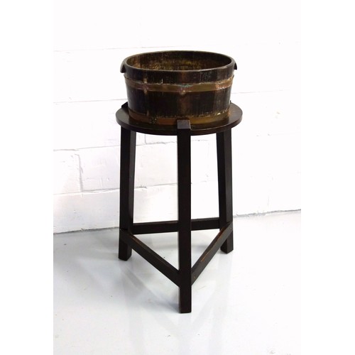 219 - Georgian oval coopered oak wine cooler with 2 brass bands, on a later tripod stand joined by stretch... 