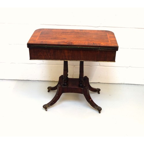 226 - George IV rosewood card table with a crossbanded rounded rectangular hinged top opening to a green b... 