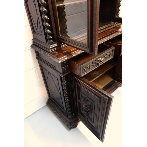 230 - 19th Century Flemish carved oak cabinet with 2 arch glazed panelled doors above, 2 drawers and 2 pan... 