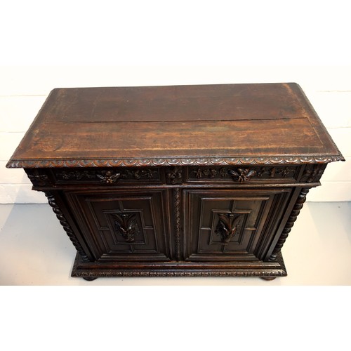 230 - 19th Century Flemish carved oak cabinet with 2 arch glazed panelled doors above, 2 drawers and 2 pan... 