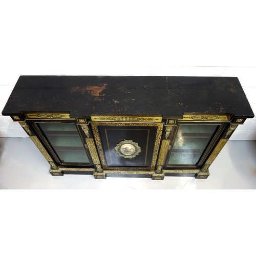 234 - Late 19th Century French ebonised side cabinet with a breakfront top, centre panelled door inset wit... 