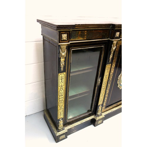 234 - Late 19th Century French ebonised side cabinet with a breakfront top, centre panelled door inset wit... 