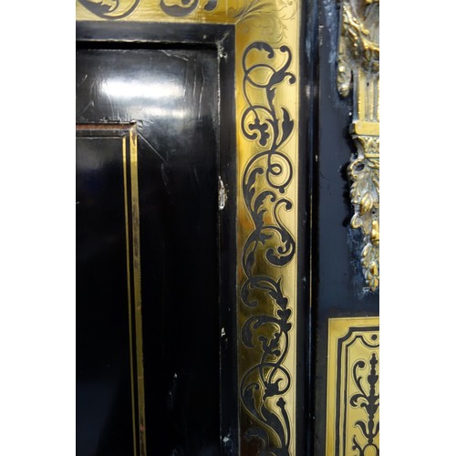 234 - Late 19th Century French ebonised side cabinet with a breakfront top, centre panelled door inset wit... 