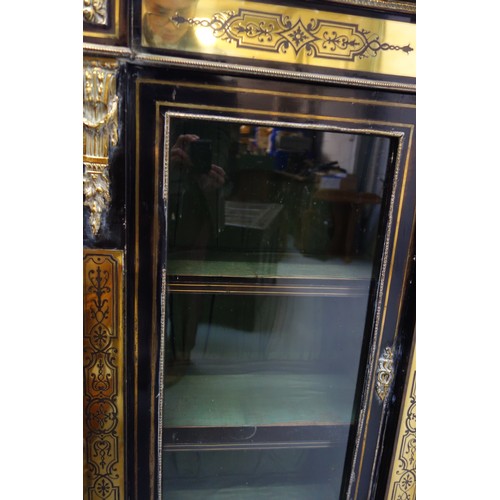 234 - Late 19th Century French ebonised side cabinet with a breakfront top, centre panelled door inset wit... 