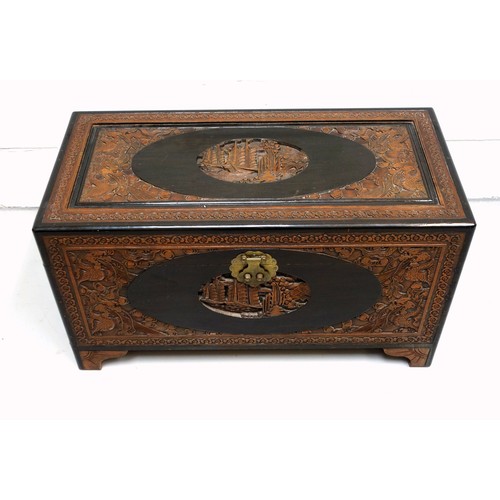 236 - Chinese part ebonised camphor lined chest with carved floral and dragon decoration, 49 x 88 x 43cm