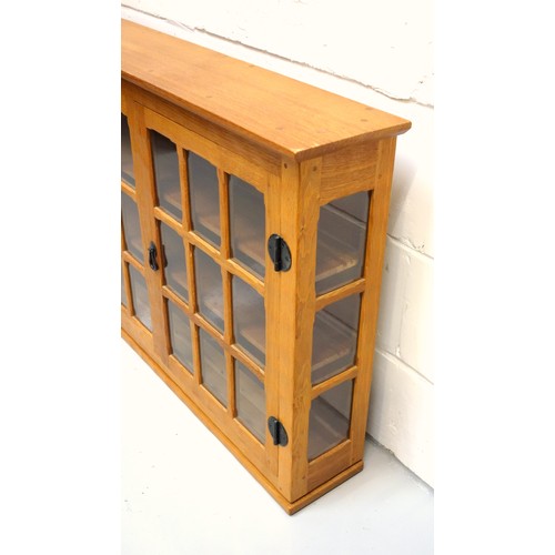 259 - Knightman, (Horace Knight, Old Mill Furniture), oak wall cabinet with 2 glazed doors and sides, the ... 