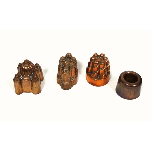 278 - Victorian copper jelly mould of castle form with a fluted central dome flanked by 4 turrets, H.15.5c... 