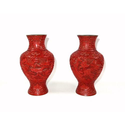 340 - Pair of Chinese red cinnabar lacquer baluster vases with all-over floral decoration, H.16.5cm, (one ... 