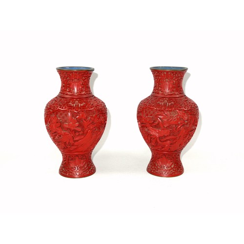 340 - Pair of Chinese red cinnabar lacquer baluster vases with all-over floral decoration, H.16.5cm, (one ... 