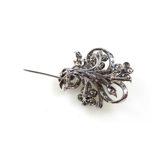 177 - Georgian style gold, silver and rose cut diamond brooch of a scrolling floral design, gold back, sil... 