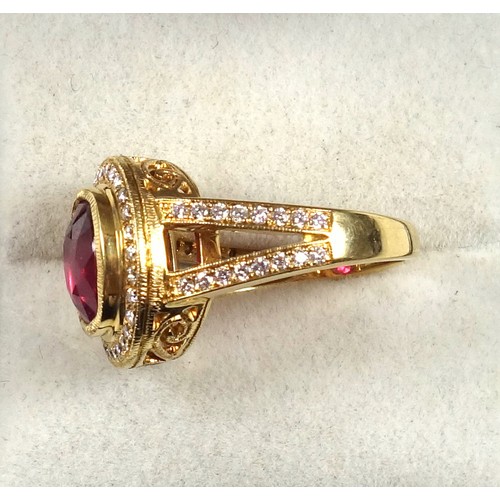 178 - Yellow metal ring set spinel and diamonds, stamped 18k, ring size M 1/2, spinel 3.5 carat approx., d... 