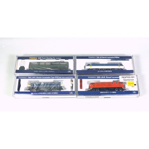 23 - 4 Tomix N Gauge diesel and electric locomotives, all in clear plastic cases. (4)