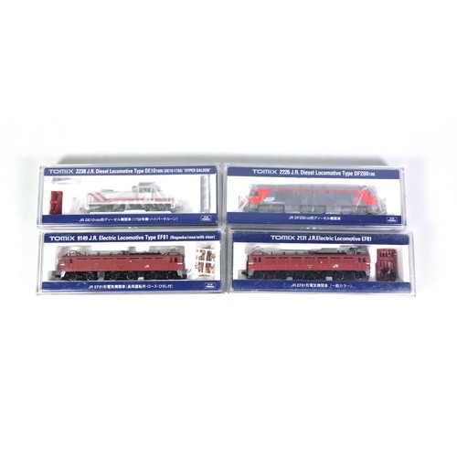 24 - 4 Tomix N Gauge diesel and electric locomotives, all in clear plastic cases. (4)