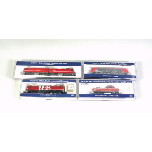 26 - 4 Tomix N Gauge diesel and electric locomotives, all in clear plastic cases. (4)