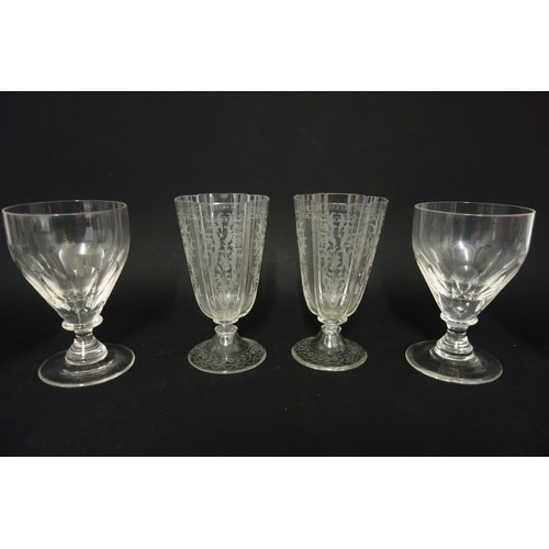 71 - Set of 12 Edwardian cut glass champagne coupes, each with pointed elliptical decoration to the bowl ... 