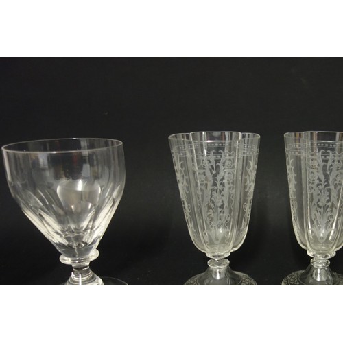 71 - Set of 12 Edwardian cut glass champagne coupes, each with pointed elliptical decoration to the bowl ... 