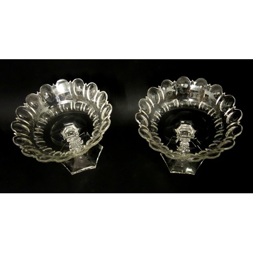 74 - Pair of Late Victorian cut glass comports, each with a circular bowl with ovolo and slice decoration... 