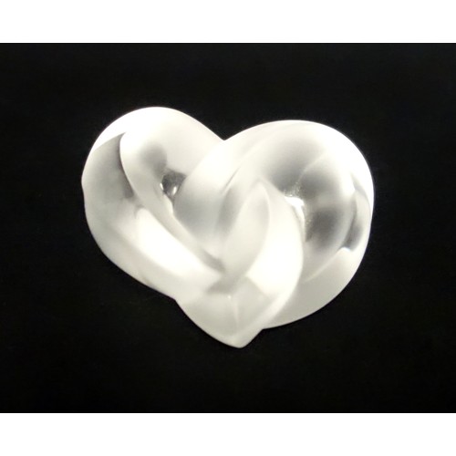 75 - Lalique France, glass knotted heart paperweight, w6.5cm.