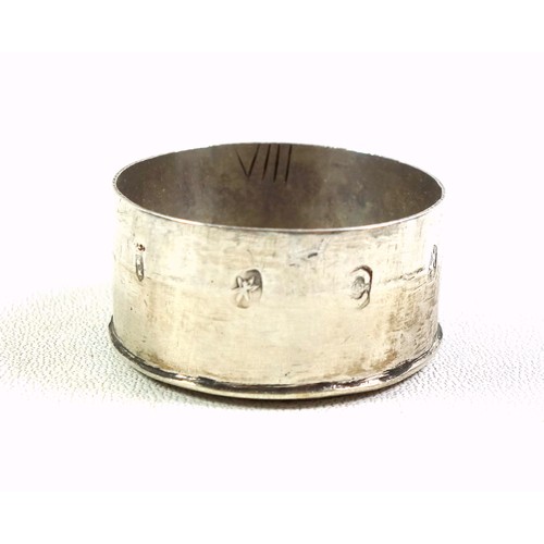 132 - Edwardian silver circular pill box, the cover embossed with a mother and child, with a gilt interior... 