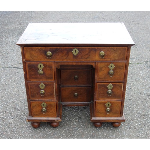 347 - Early Georgian unusual figured walnut kneehole desk, the quartered top with herringbone stringing an... 