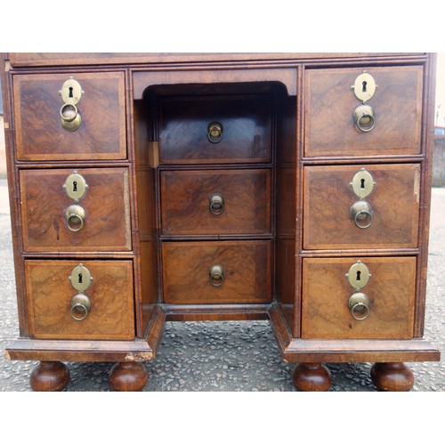 347 - Early Georgian unusual figured walnut kneehole desk, the quartered top with herringbone stringing an... 