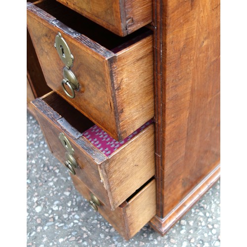 347 - Early Georgian unusual figured walnut kneehole desk, the quartered top with herringbone stringing an... 