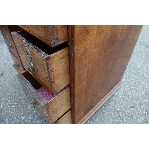 347 - Early Georgian unusual figured walnut kneehole desk, the quartered top with herringbone stringing an... 