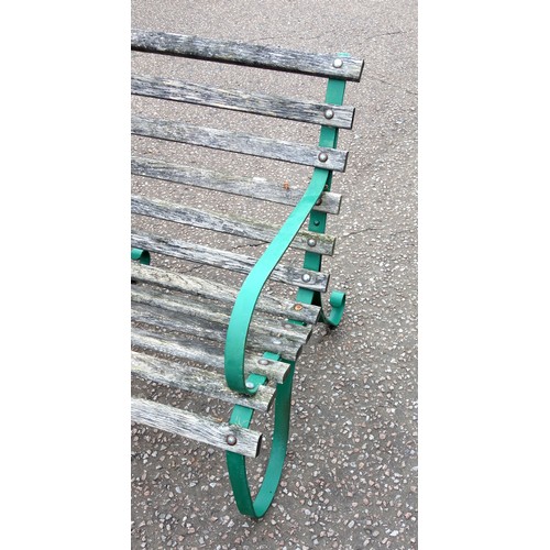 403 - Victorian style wrought iron bench with curved arms and teak slats, 85 x 152 x 82cm