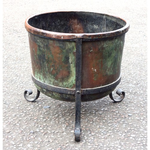 407 - Copper circular log bin with 3 wrought iron scroll legs, H.48.5 x Dia.49.5cm