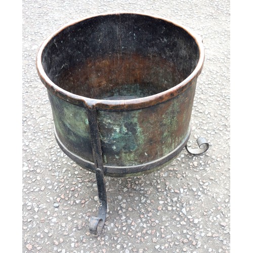 407 - Copper circular log bin with 3 wrought iron scroll legs, H.48.5 x Dia.49.5cm