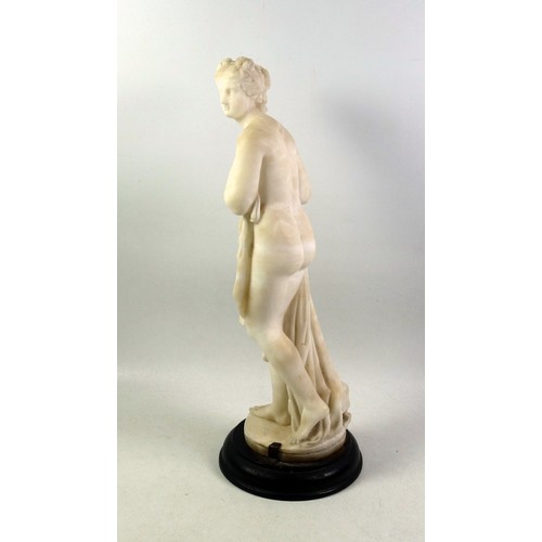 414 - Italian alabaster figure of Pandora, the first woman, standing on a circular base, H.35cm overall, (... 