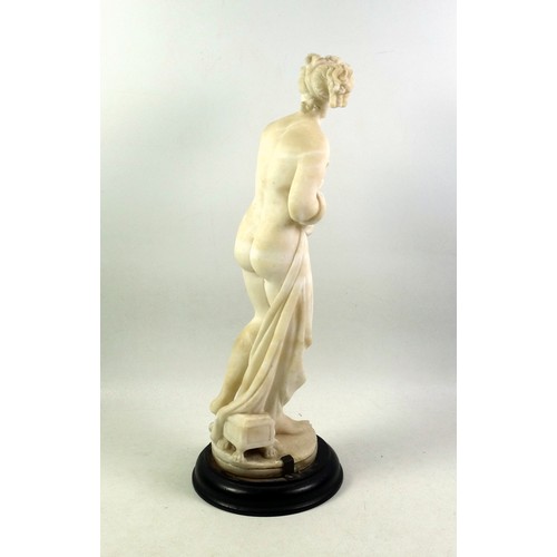 414 - Italian alabaster figure of Pandora, the first woman, standing on a circular base, H.35cm overall, (... 