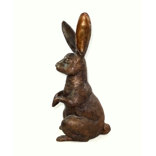 416 - A bronzed sculpture of a hare sat upright on hind legs, 20th century, unsigned, 41.5cm high.