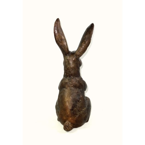 416 - A bronzed sculpture of a hare sat upright on hind legs, 20th century, unsigned, 41.5cm high.