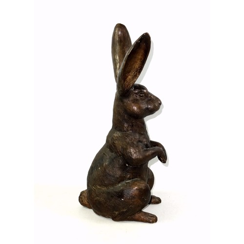 416 - A bronzed sculpture of a hare sat upright on hind legs, 20th century, unsigned, 41.5cm high.